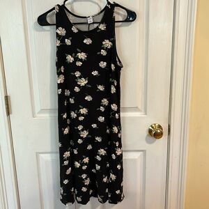 Sleeveless sundress with Dogwood  flowers on it